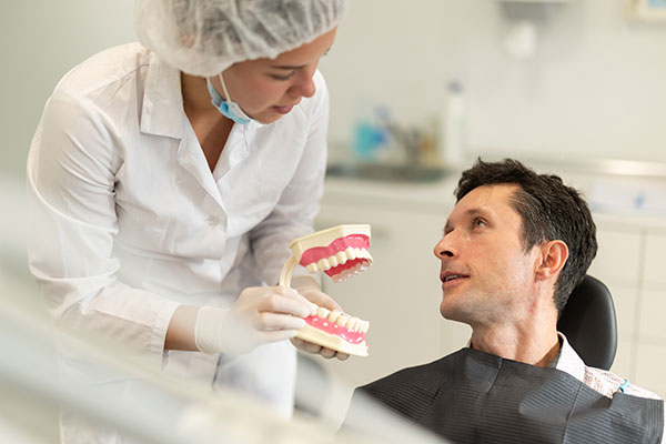Bring Back A Stronger Smile With Implant Supported Dentures